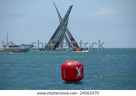 AUCKLAND, NEW ZEALAND - 30 JANUARY - 14 FEBRUARY, 2009: Louis Vuitton Pacific Series sees Americas Cup rival teams match race one another in other teams boats. Shown here is USA Oracle in Team NZ\'s yacht & South Africa in USA Oracle\' boat practice