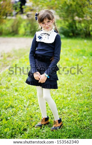 School girl in navy blue uniform