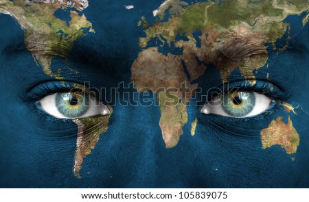 Human face painted with planet earth - \