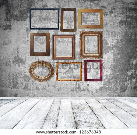Empty room with vintage frames