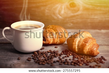 Coffee and fresh croissant