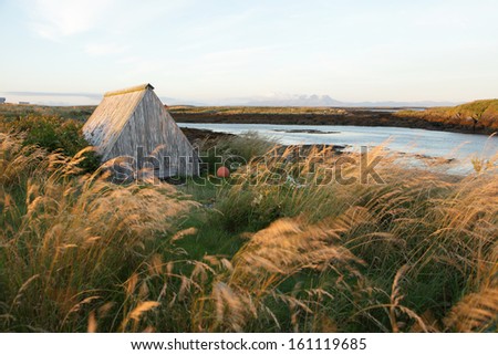 Eider house at Lanan island in Norway. People build shelters for eider ducks and get eider down in return after ducks leave the nest. Down is used for duvet filling and other products.