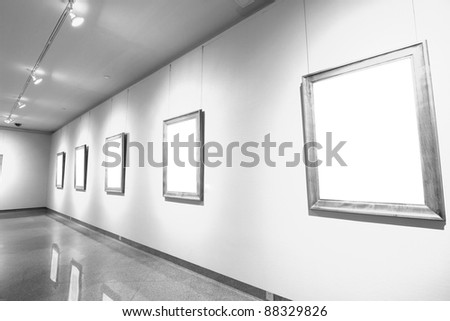 empty frames in a room against a white wall