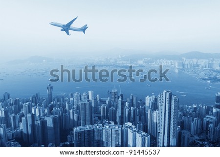 hongkong\'s skyscrapers and airplanes on sky