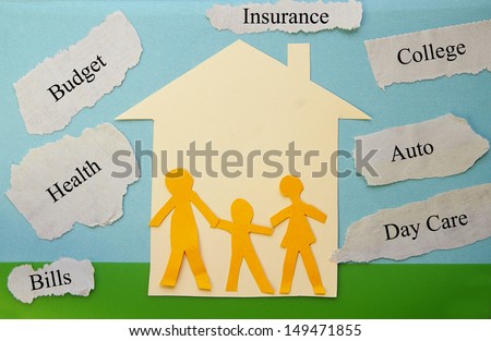 paper family cutouts with economic concept paper scraps