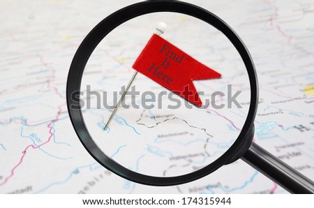 pin with Find It Here red flag and magnifying glass