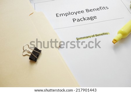 Employee benefits documents with highlighted text