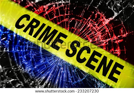 Broken window with yellow Crime Scene tape