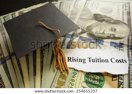 Graduation cap on cash with Rising Tuition Costs newspaper headline