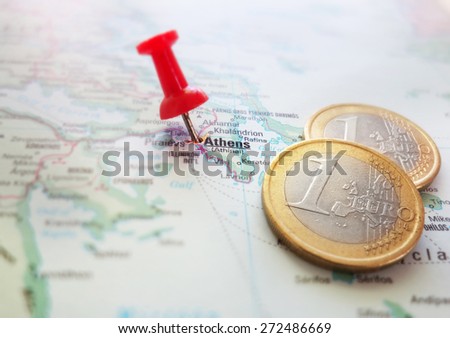 Closeup of a Greece map with Euro coins