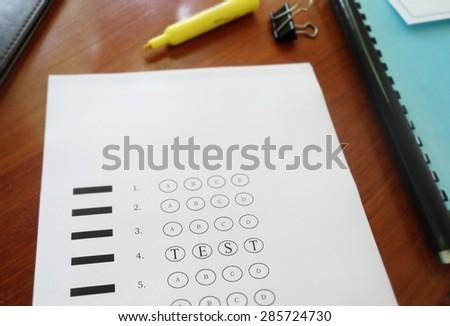 Multiple choice exam paper with Test text