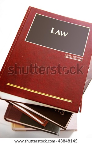 stack of law books from above,on white