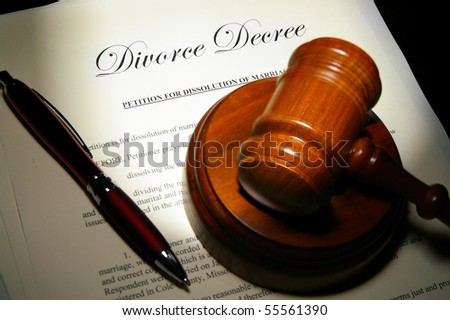 Divorce papers and pen with judge's legal gavel