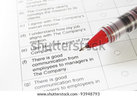 closeup of a blank employment survey with red pen