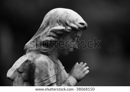 Statue marking the grave of a small child that died much too soon. From the 1890\'s.