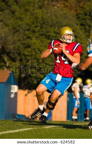 UCLA Bruin Quarterback about to throw the ball