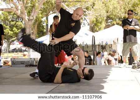 Festival of Pilpino Arts and Culture (FPAC), San Pedro, CA Sept 8th, 2007:  Filipino martial artists demonstrating self defense and martial arts techniques.