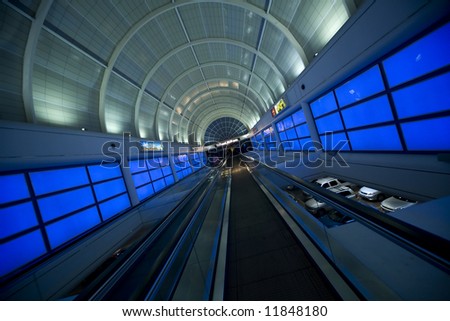 The moving walkway leading to the Las Vegas Sidewalk from a strip  casino.