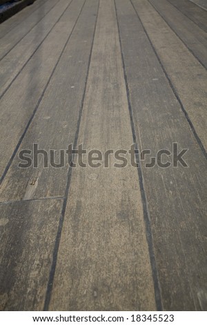 Wooden plank deck on an old tall ship.