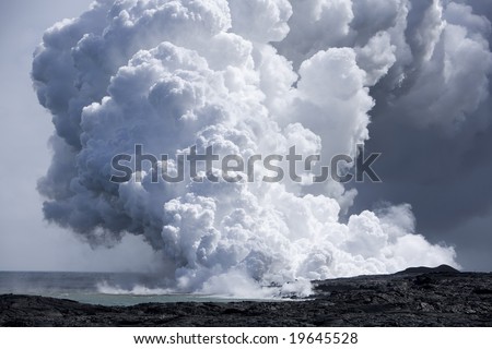 Steam cloud formed by the flow of Lava on Hawai\'i from Mt. Kilauea.