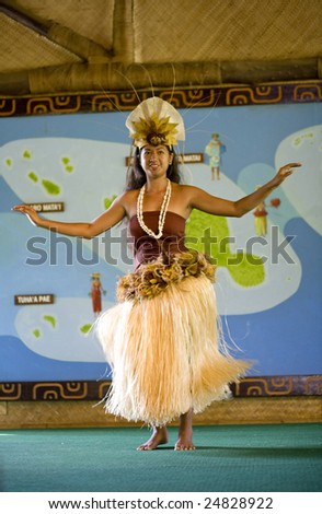 LA\'IE, HI - JULY 26: Tahitian student performs a cultural dance in the Polynesian Cultural Center (PCC) in 2008. The PCC is Hawaii\'s top paid attraction, and supports BYU students.