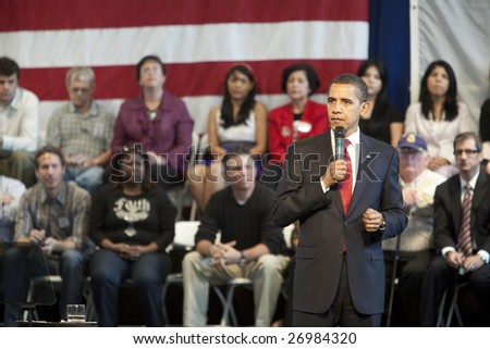 LOS ANGELES - MARCH 19: President Obama listens to questions at a town hall meeting at the Miguel Contreras Learning Center on March 19th, 2009 in Los Angeles. 1,100 people attended to hear him speak.