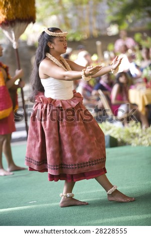 LA\'IE, HI - JULY 26: Students perform Hawaiian dance during a luau at the Polynesian Cultural Center (PCC) July 26th, 2008 in La\'ie, HI. The PCC is Hawai\'i top paid attraction.