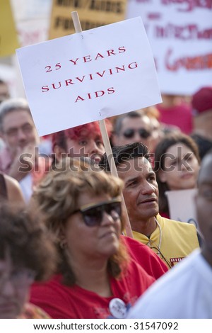 HOLLYWOOD - JUNE 5: Supporters of AIDS Project Los Angeles protest against budget cuts in HIV/AIDS prevention and care programs by Sacramento on June 5th, 2009 in Hollywood, CA.