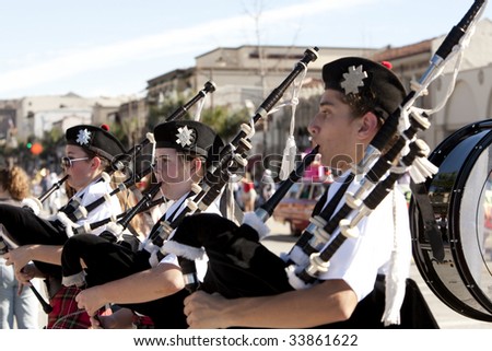 PASADENA, CA - JANUARY 18:  A bag pipe band marches at the Doo Dah Parade on January 18th in Pasadena, CA.  The Doo Dah Parade is a parody of Pasadena\'s more famous Rose Parade.