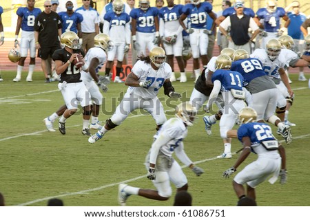 LOS ANGELES - AUGUST 21: UCLA Bruins scrimmage against each other on August 21, 2010 in Los Angeles. Quarterback Richard Brehaut passes the ball.