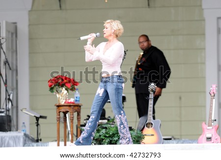 OCALA, FL - DECEMBER 12: Country music star Lorrie Morgan (left) playing live onstage at Silver Springs on December 12, 2009 in Ocala, Florida