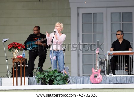 OCALA, FL - DECEMBER 12: Country music star Lorrie Morgan (center) playing live onstage at Silver Springs on December 12, 2009 in Ocala, Florida