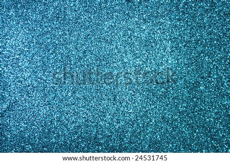 A glittery blue paper decorative background
