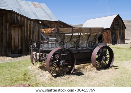 Old wagon and abandoned buildings, Bodie State Historic Park, California
