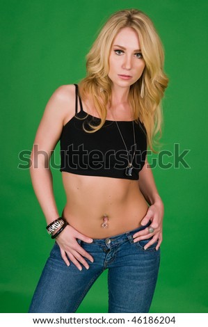 Beautiful young blonde in a black top and jeans