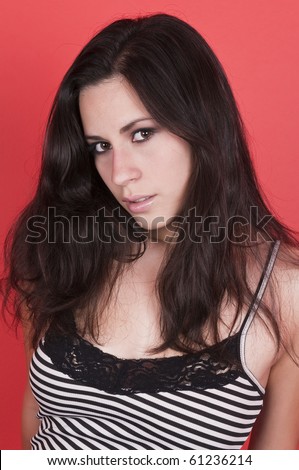 Beautiful young Latina in a striped blouse