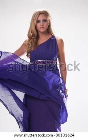 Beautiful tall blonde in the costume of a Greek goddess