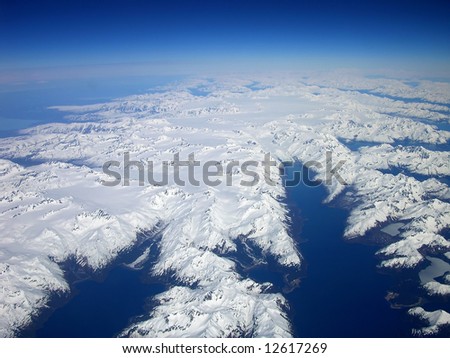 Aerial Alaska - with glaciers, inlets, rivers, mountains and ocean.