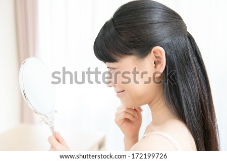 Beautiful asian woman Skin care smile face close up