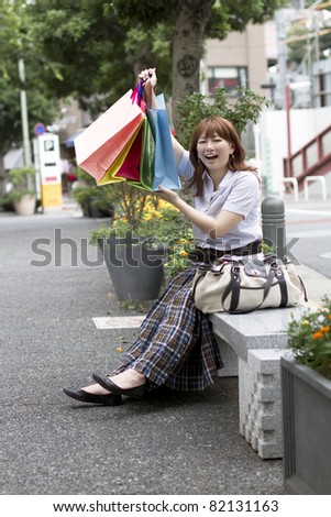 Asian shopping woman