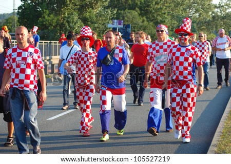 GDANSK, POLAND - JUNE 18: Croatian football fans on their way to EURO 2012 match Spain vs. Croatia on June 18, 2012 in Gdansk, Poland