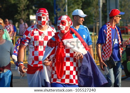GDANSK, POLAND - JUNE 18: Croatian football fans on their way to EURO 2012 match Spain vs. Croatia on June 18, 2012 in Gdansk, Poland