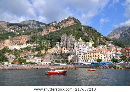 AMALFI, ITALY - AUGUST 16, 2014: Picturesque summer landscape of town Amalfi, Italy. Amalfi is surrounded by cliffs and coastal scenery. It is included in the UNESCO World Heritage Sites