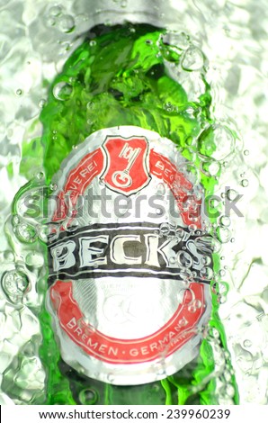 KWIDZYN, POLAND  JULY 12, 2014: Becks beer in splashed water. Becks brewery was founded in 1873 in Bremen, Germany.