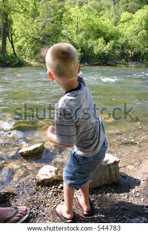 Throwing rocks in the river