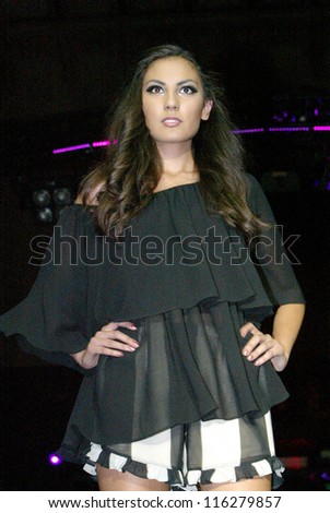 LOS ANGELES, CA - OCTOBER 18:  An unidentified model walks the runway during the 2012 Fashion Minga fashion show during LA Fashion Week at Exchange LA on October 18, 2012 in Los Angeles, CA