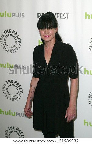 BEVERLY HILLS - MARCH 13:  Pauley Perrette arrives at the 2013 Paleyfest 