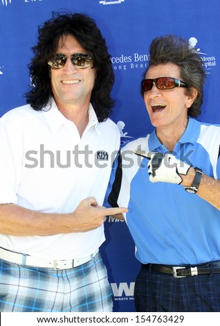MOOREPARK, CA - SEPT 16:  Tommy Thayer and Gary Mule Deer arrive at the 6th Annual Scott Medlock & Robby Krieger Golf Invitational & All-Star Concert on September 16, 2013 in Moorepark CA.