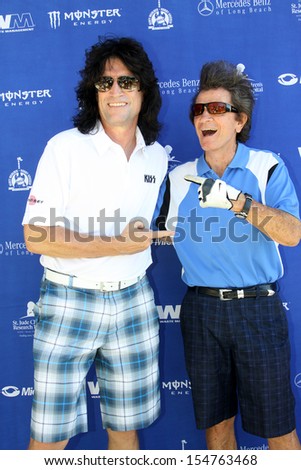 MOOREPARK, CA - SEPT 16:  Tommy Thayer and Gary Mule Deer arrive at the 6th Annual Scott Medlock & Robby Krieger Golf Invitational & All-Star Concert on September 16, 2013 in Moorepark CA.