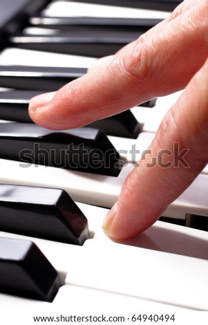 hands playing music on the piano, hands and piano player, keyboard .